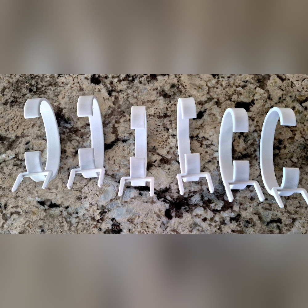 White Plastic Watch Display Stands